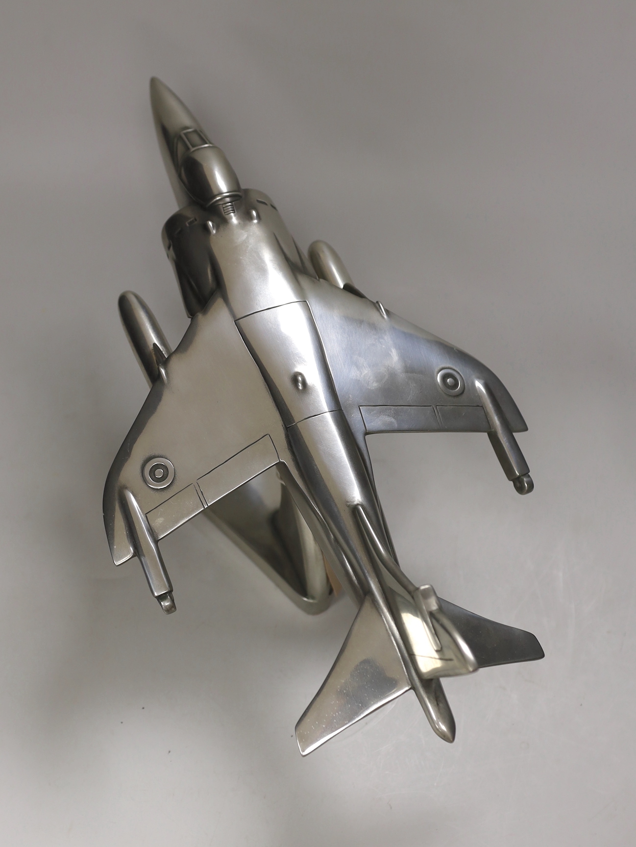 An aluminium Harrier jet model, 42cm long